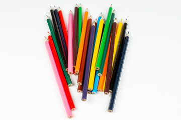 a stack of wooden colored pencils for drawing