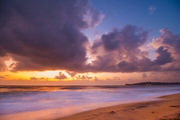 Naklejka na ściany i meble A breath taking sunrise at Arugam Bay, Sri Lanka