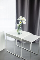 Flowers in vase in home interior