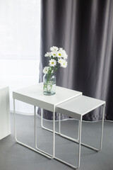 Flowers in vase in home interior