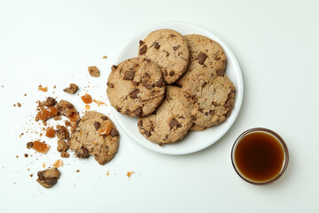 Tasty cookies with caramel on white background