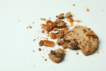 Tasty cookie with caramel on white background