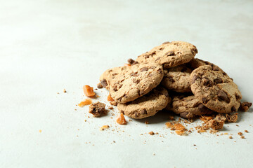 Cookies with caramel on white textured background
