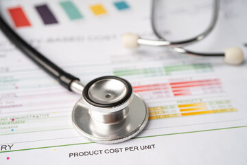 Stethoscope on chart or graph paper, Financial, account, statistics and business data  medical health concept.