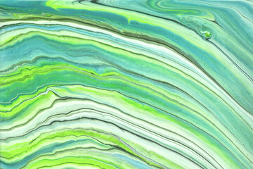 Abstract fluid art background light green and turquoise colors. Liquid marble. Acrylic painting with blue gradient.