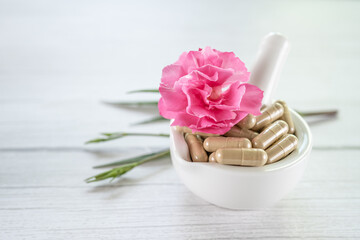 Alternative medicine herbal organic capsule with vitamin E omega 3 fish oil, mineral, drug with herbs leaf natural supplements for healthy good life.