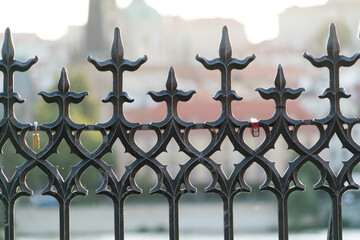 View of the Prague castle through a metal fence