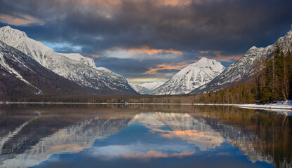 Lake McDonald, mountains reflecting in the water in Glacier National Park, Montana, USA