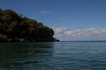 summer sea blue sky green peninsula