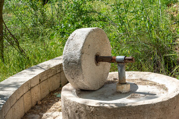 The millstone, olive oil press squeeze out olive oil