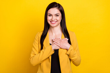 Photo of adorable sweet young lady dressed formal blazer smiling arms chest isolated yellow color...