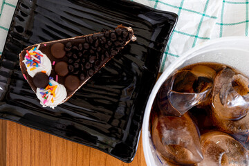 Chocolate Cake with Black Soft Drink