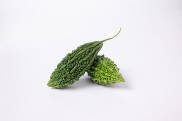Fresh bitter gourd on a white background