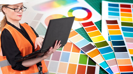 Interior design. The girl works as a room designer. Select a color palette. Color of the walls in...