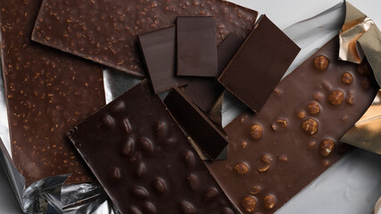 Coffee beans and chocolate close-up. Natural brown background.