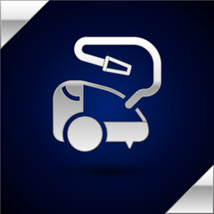 Silver Vacuum cleaner icon isolated on dark blue background. Vector