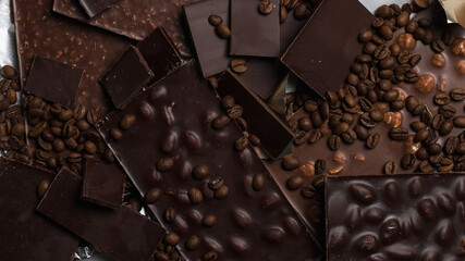 Coffee beans and chocolate close-up. Natural brown background.