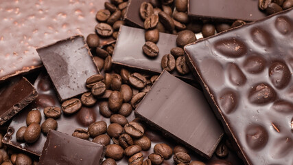 Coffee beans and chocolate close-up. Natural brown background.