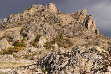 rocky peak and dramatic sky scenery