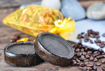 Black coffee soap on blurred background