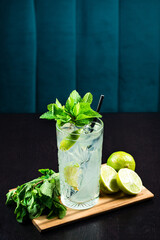 Cold fresh lemonade drink on a wooden table