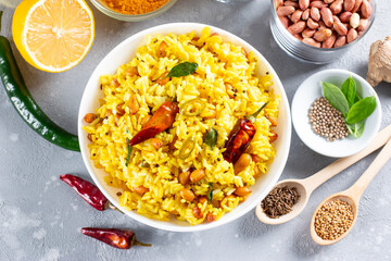 Yellow Rice, Turmeric Rice wih Lemon, Ginger and Fenugreek in a bowl, Indian Food. Top view