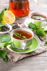 Nettle tea. Fresh and dry stinging nettle. Folk remedy