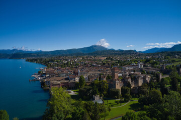 Lazise Lake Garda Italy. Panorama of the historic town of Lazise. Aerial view of the Scaliger Castle of Lazise. Top view of the historic part of the city Lazise Castle on the coastline of Lake Garda.