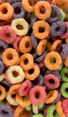 multicolored bright dry breakfast on pink background