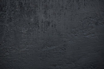 Cement and concrete grunge texture background painted to black