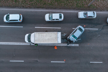 the car got into a traffic accident from a height. Shooting a road transport production from a drone - obrazy, fototapety, plakaty