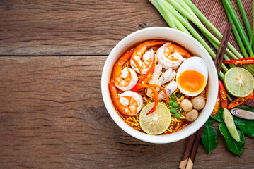 instant noodles tomyumkung.thai spicy food with herb
