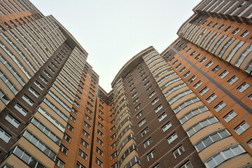 Fototapeta premium Modern district town real estate house exterior. High brick residental building