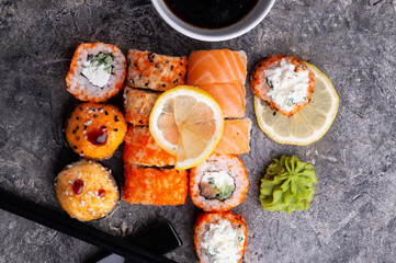 sushi roll set served  at grey table. flat lay. close up