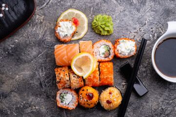 sushi roll set served  at grey table. flat lay. close up
