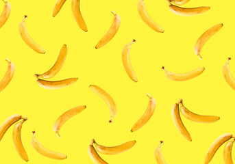 Ripe bananas on a yellow background. Bananas pattern.