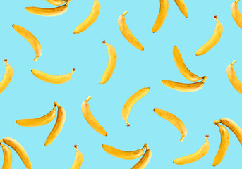 Ripe bananas on a light blue background. Bananas pattern.