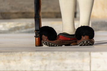 Greece, Athens: Detail close up of traditonal boots of the Presidential Guard soldiers (Evzones or...
