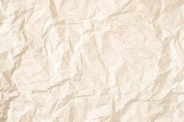 Warm crumpled paper as background.