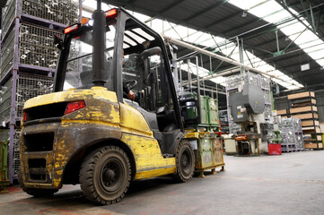 Forklift loader. Pallet stacker truck equipment at warehouse. High quality photo