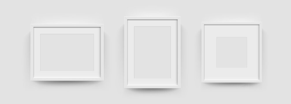 Photo picture frames on wall, vector white mockups or empty posters. Empty photo frames mockups for pictures or photograph, realistic 3D blank templates