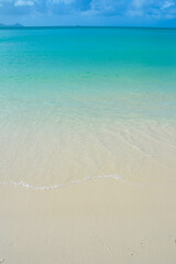 Fototapeta na wymiar Turquoise blue waters with white sand