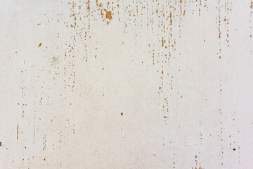 Background of rusty metal wall covered with paint peeling off