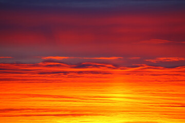 Layered cloudscape in orange and pink color