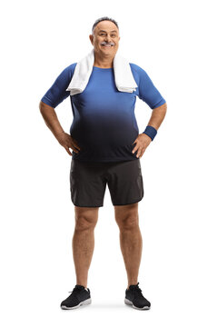 Full length portrait of a mature man in sportswear with a towel around his neck