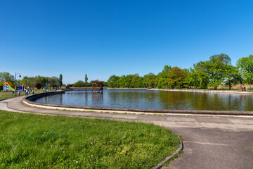 Fototapeta na wymiar Kikinda, Serbia - May 04, 2021: The idylic rest zone - The Old lake (Staro Jezero: serbian) in the park of Kikinda town, Serbia