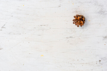 Pine cone on old wooden table