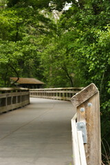 Perspective looking at where the handrail begins in the park