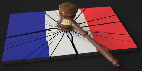 Broken block with flag of France and judge's gavel. Conceptual 3d rendering