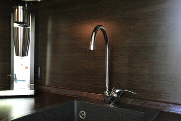 stylish chrome faucet in the kitchen